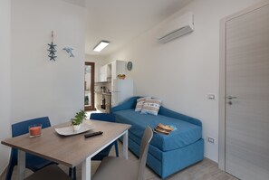 Apartment, 2 Bedrooms | Living area | LCD TV - I tre Golfi Neklite (San Vito Lo Capo)