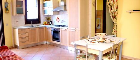 Appartement, 2 chambres | Cuisine privée | Réfrigérateur, four, plaque de cuisson, congélateur