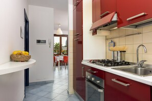 Apartment, 1 Bedroom | Private kitchen | Fridge, oven, stovetop, espresso maker - I tre Golfi Zenzero (San Vito Lo Capo)
