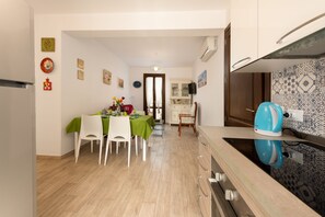 Apartment, 2 Bedrooms | Private kitchen | Fridge, microwave, oven, stovetop - I tre Golfi Nilo Arancio (San Vito Lo Capo)