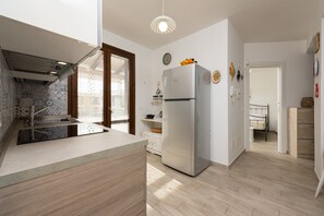 Apartment, 2 Bedrooms | Private kitchen | Fridge, microwave, oven, stovetop - I tre Golfi Nilo Arancio (San Vito Lo Capo)