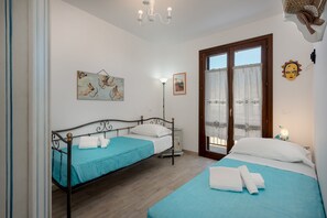 Apartment, 2 Bedrooms | 2 bedrooms, cribs/infant beds, free WiFi - I tre Golfi Nilo Arancio (San Vito Lo Capo)