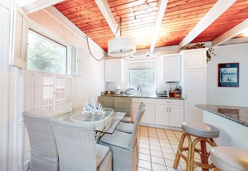 Summer home with expansive deck & wonderful location for beachgoers