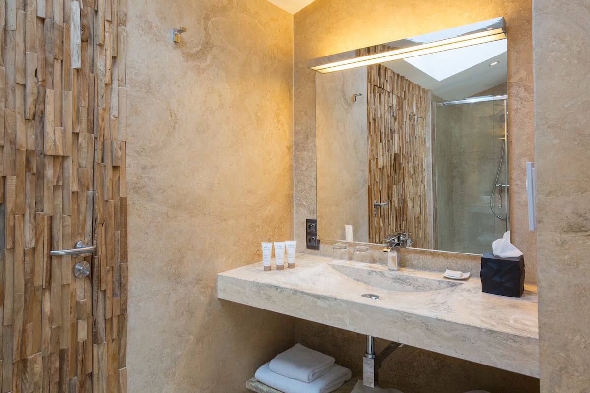 suite l'alba | bathroom | designer toiletries, hair dryer, bathrobes, slippers