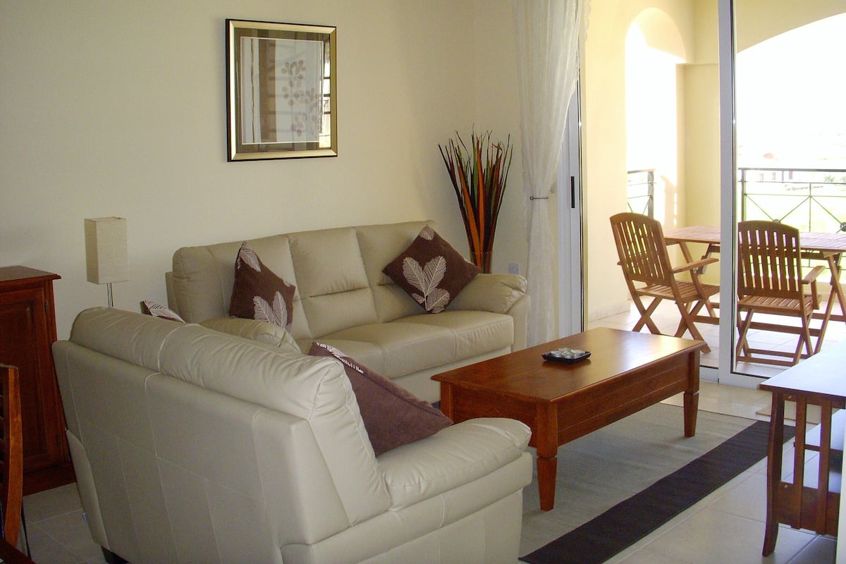 Penthouse Apartment (Max 4) | Living area | 32-inch flat-screen TV with digital channels, TV, DVD player
