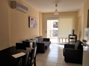 2 Bedroom Apartment (Max 4) | Living area | 32-inch flat-screen TV with digital channels, TV, DVD player - Mazotos Panoramic Village (Mazotos)