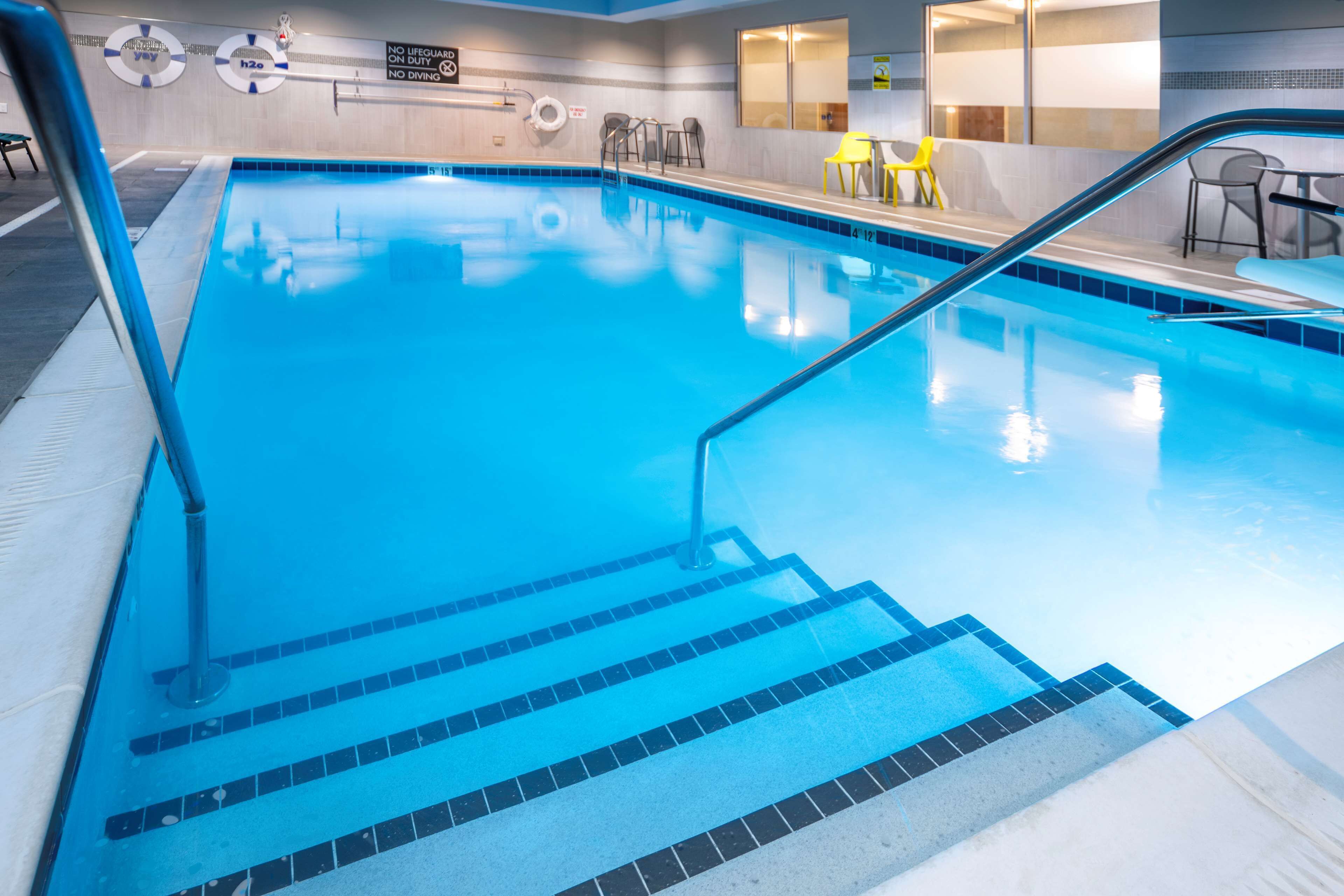 indoor pool, open 8:00 am to 10:00 pm, pool loungers