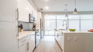 Apartment | Private kitchen | Fridge, microwave, oven, stovetop