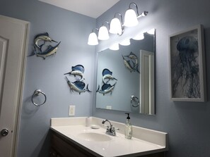 Combined shower/bathtub, hair dryer, towels, soap