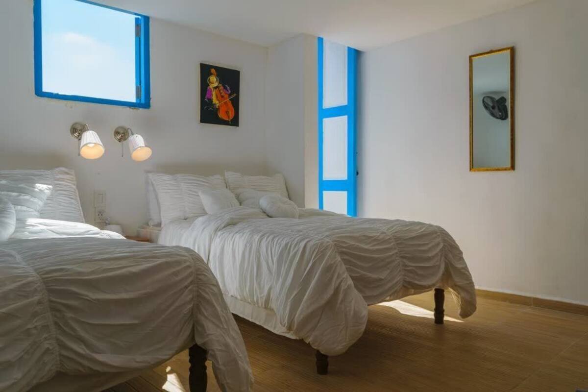Double Room | Minibar, in-room safe, individually decorated, individually furnished