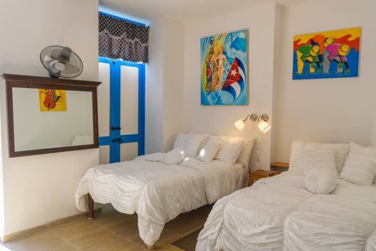 Double Room | Minibar, in-room safe, individually decorated, individually furnished