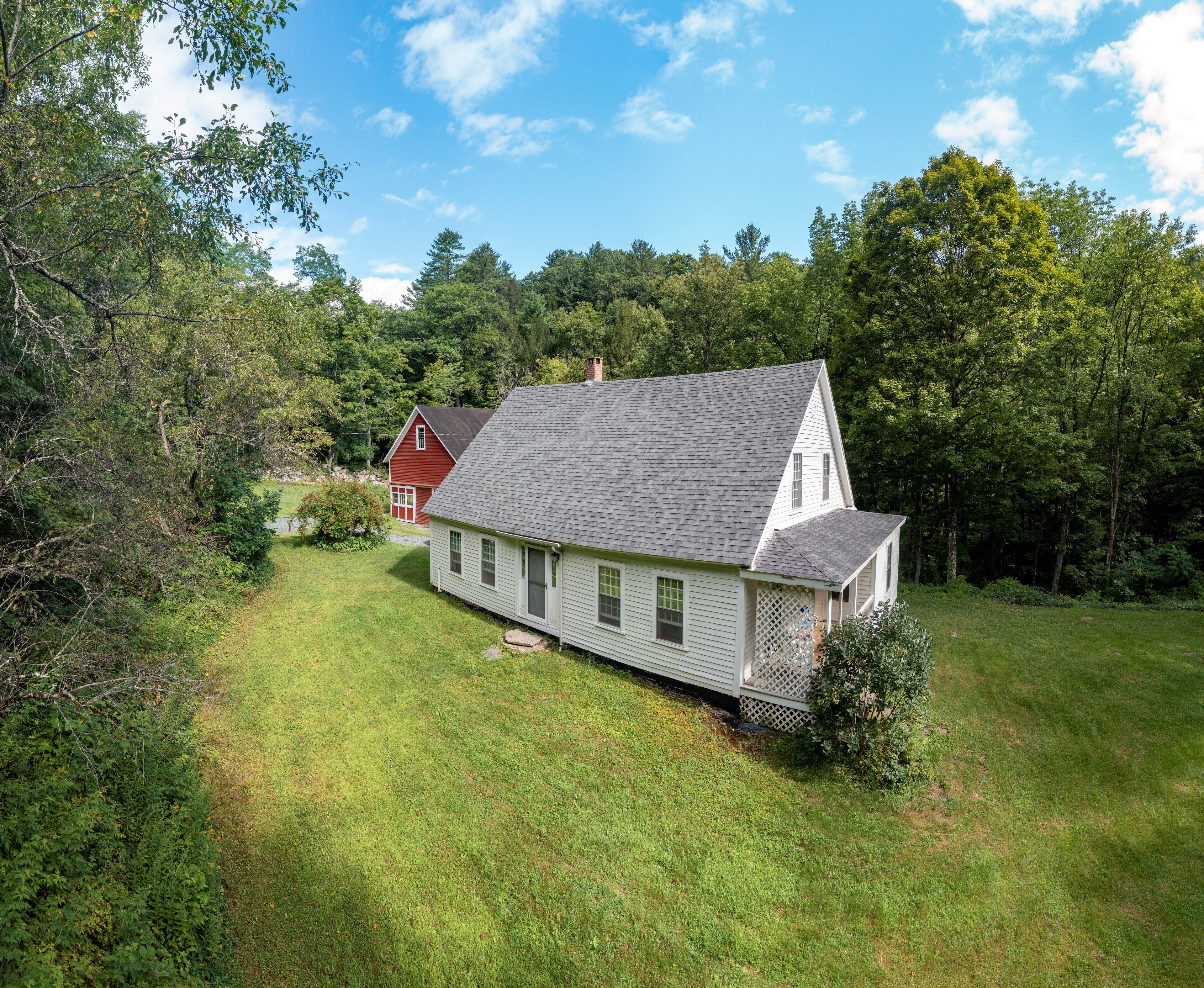 Farm house on a brook.