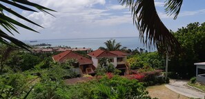 Exterior - Wake up to panoramic views of Dickenson Bay and unwind to spectacular sunsets (St. John's)