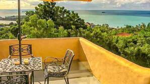Unclassified image, 4 of 28, button - Wake up to panoramic views of Dickenson Bay and unwind to spectacular sunsets (St. John's)