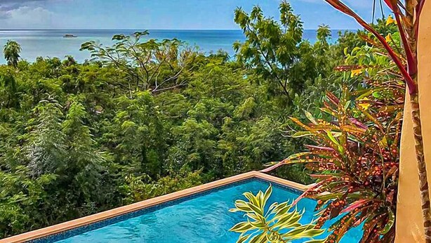 Unclassified image, 1 of 28, button - Wake up to panoramic views of Dickenson Bay and unwind to spectacular sunsets (St. John's)