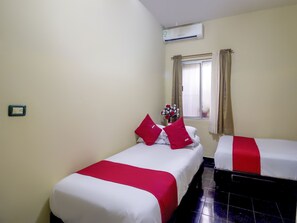 Habitación estándar, 2 camas individuales | Ropa de cama 