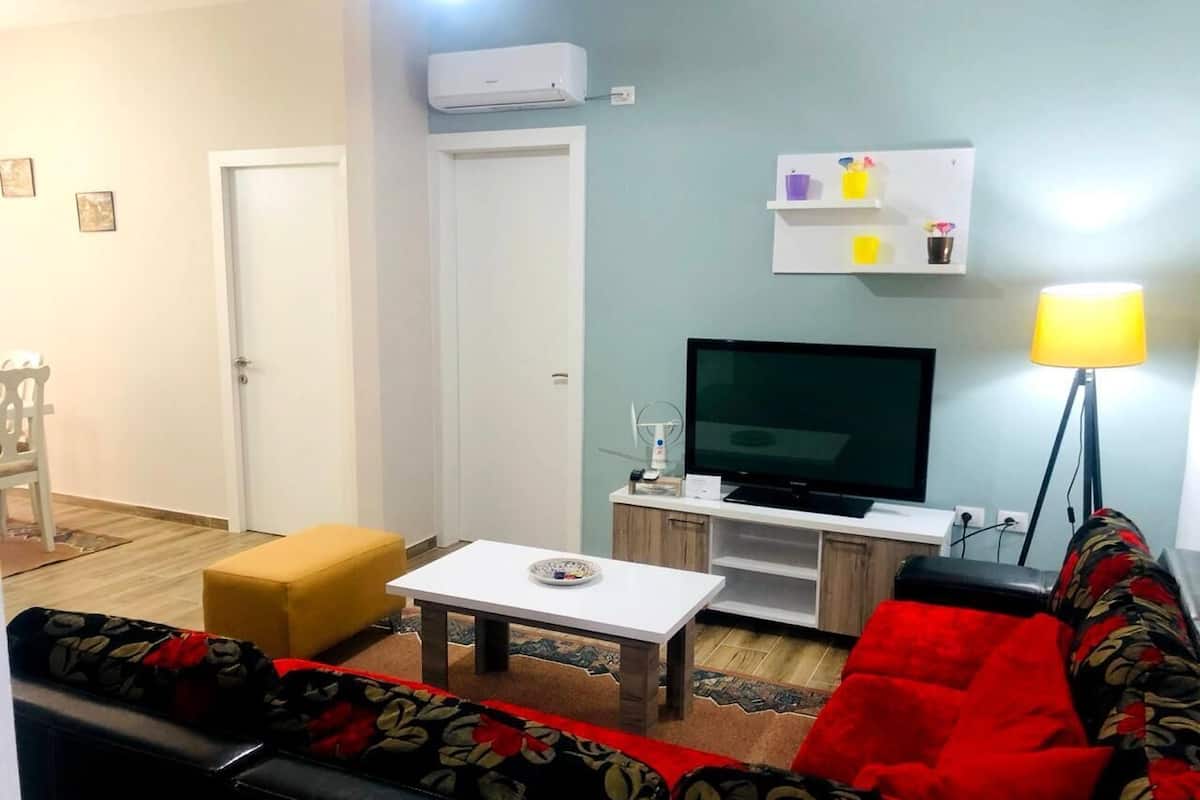 Comfort Apartment, 2 Bedrooms, Balcony, City View | Living area | 90-cm plasma TV with cable channels, TV