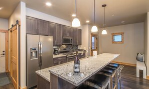 Fridge, microwave, oven, stovetop - Chic Home Close to Town Center! Hot Tub! 5 Min Walk to Shuttle! 15 Min Drive to (Big Sky)