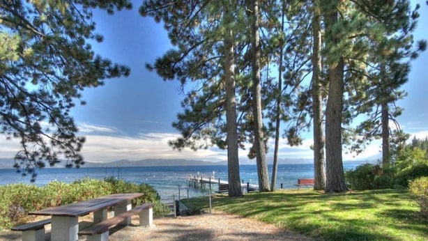 A picnic area with benches and a view of the sea. - Fir Forest Cottage by Hauserman Rental Group (Tahoe City)