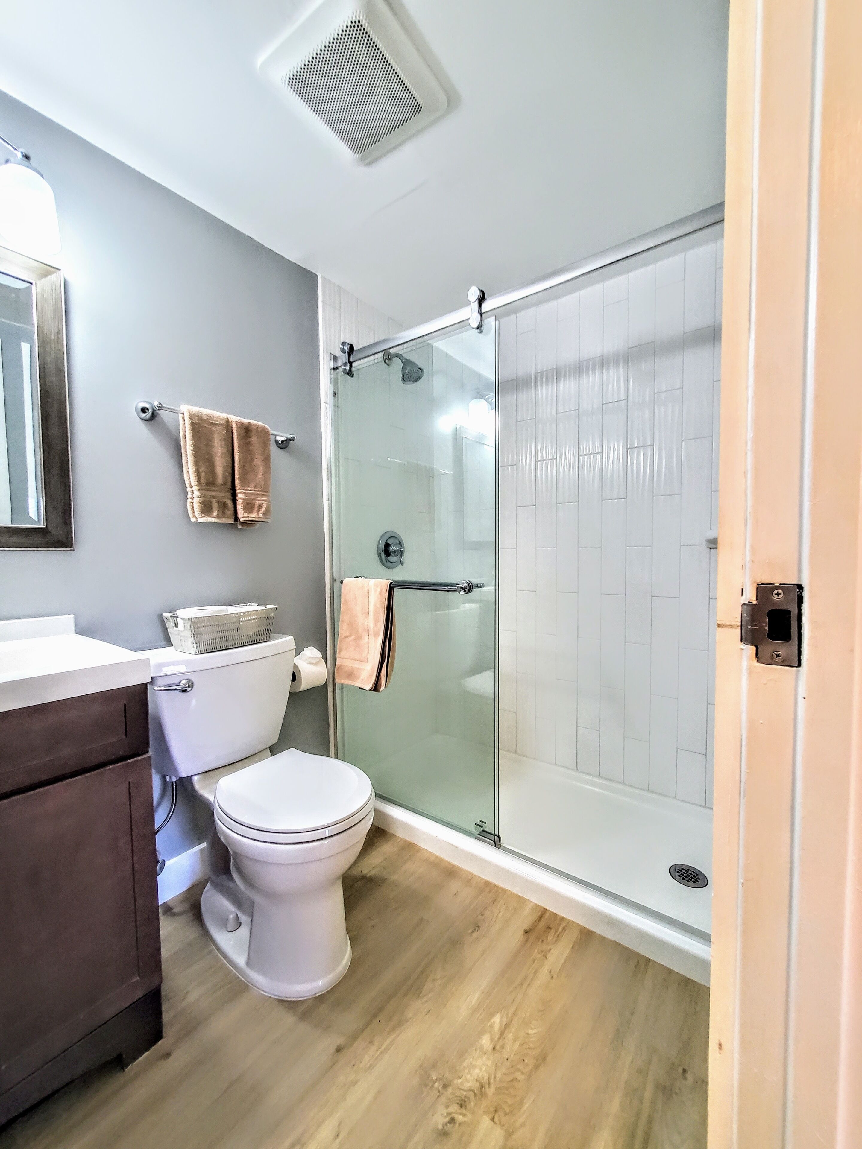 Combined shower/tub, hair dryer, towels, soap