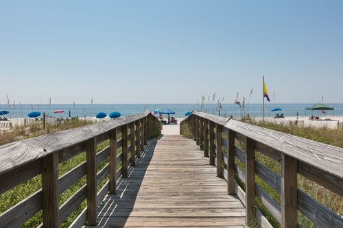 Gulf front condo with community outdoor and indoor pools, hot tub, and sauna