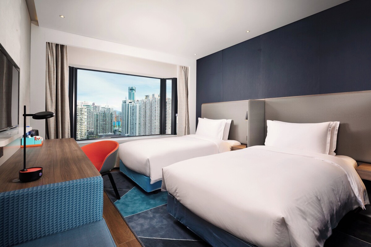 Blackout curtains, soundproofing, free WiFi, bed sheets