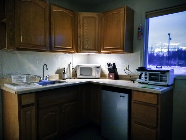 Fridge, microwave, coffee/tea maker, toaster