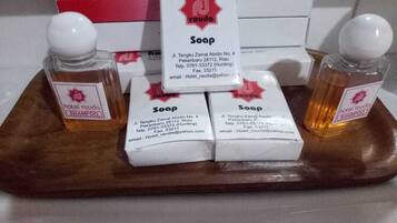 Shower, towels, soap, shampoo