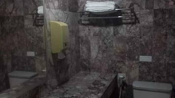 Shower, towels, soap, shampoo