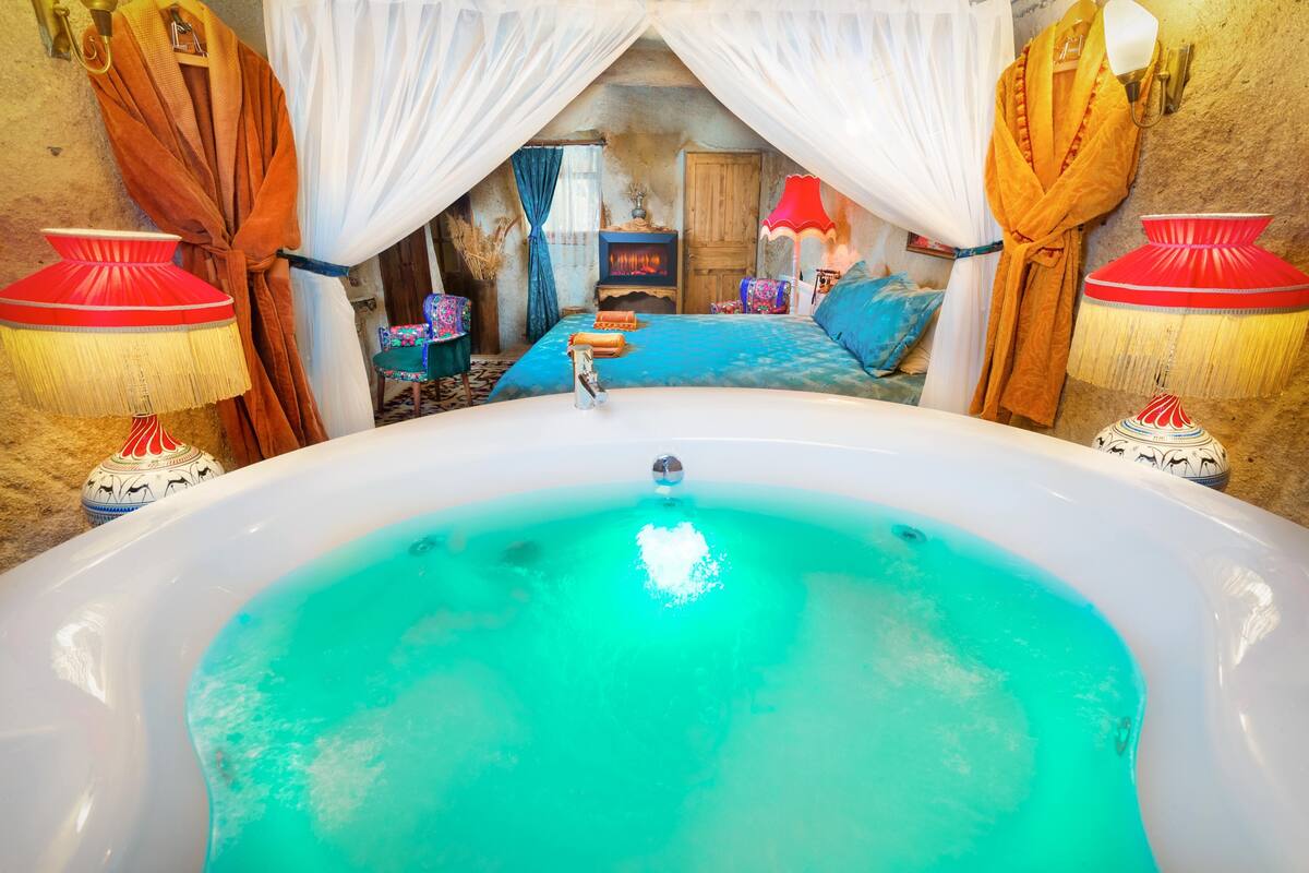 deluxe double room | bathroom | shower, rainfall showerhead, designer toiletries, hair dryer