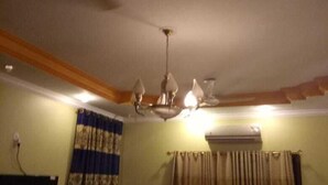 Family Room | 10 bedrooms, blackout drapes, soundproofing - Pearl Inn Gulshan (Karachi)