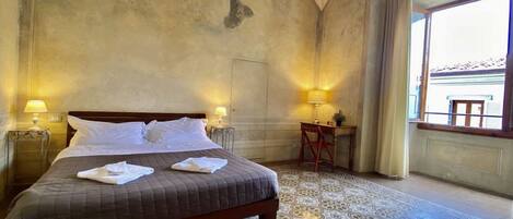 1 slaapkamer, een strijkplank/strijkijzer, gratis wifi, beddengoed