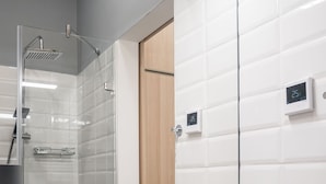 Shower, rainfall showerhead, slippers, towels - Stunning Studio Apartment (Budapest)