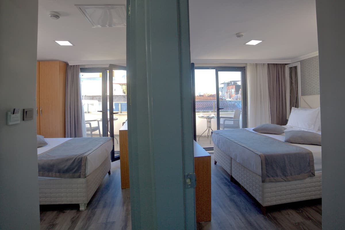 Luxe beddengoed, een minibar, een kluis op de kamer, geluiddichte muren