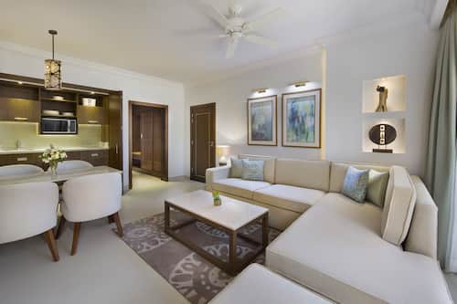 One Bedroom Suite | Living room | Flat-screen TV