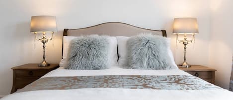 1 bedroom, desk, iron/ironing board, travel crib