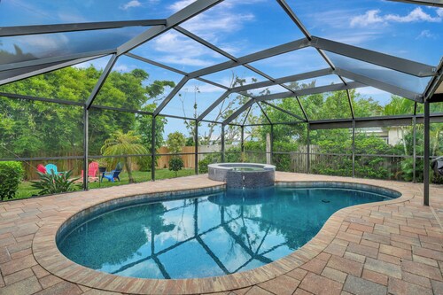 Pool  Side  Paradise in Southwest Cape Coral NO CHARGE HEATED POOL fenced yard 