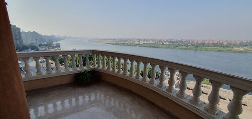 Charming sunset,with Panoramic Nile view and pyramid view.
