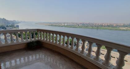 Charming sunset,with Panoramic Nile view and pyramid view.