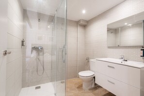 Shower, hair dryer, towels, soap