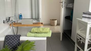Hair dryer, towels, soap, shampoo