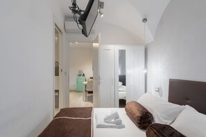 1 غرفة نوم ومكواة/لوح كي وواي فاي وملاءات أسرّة