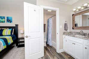 Bathtub, hair dryer, towels