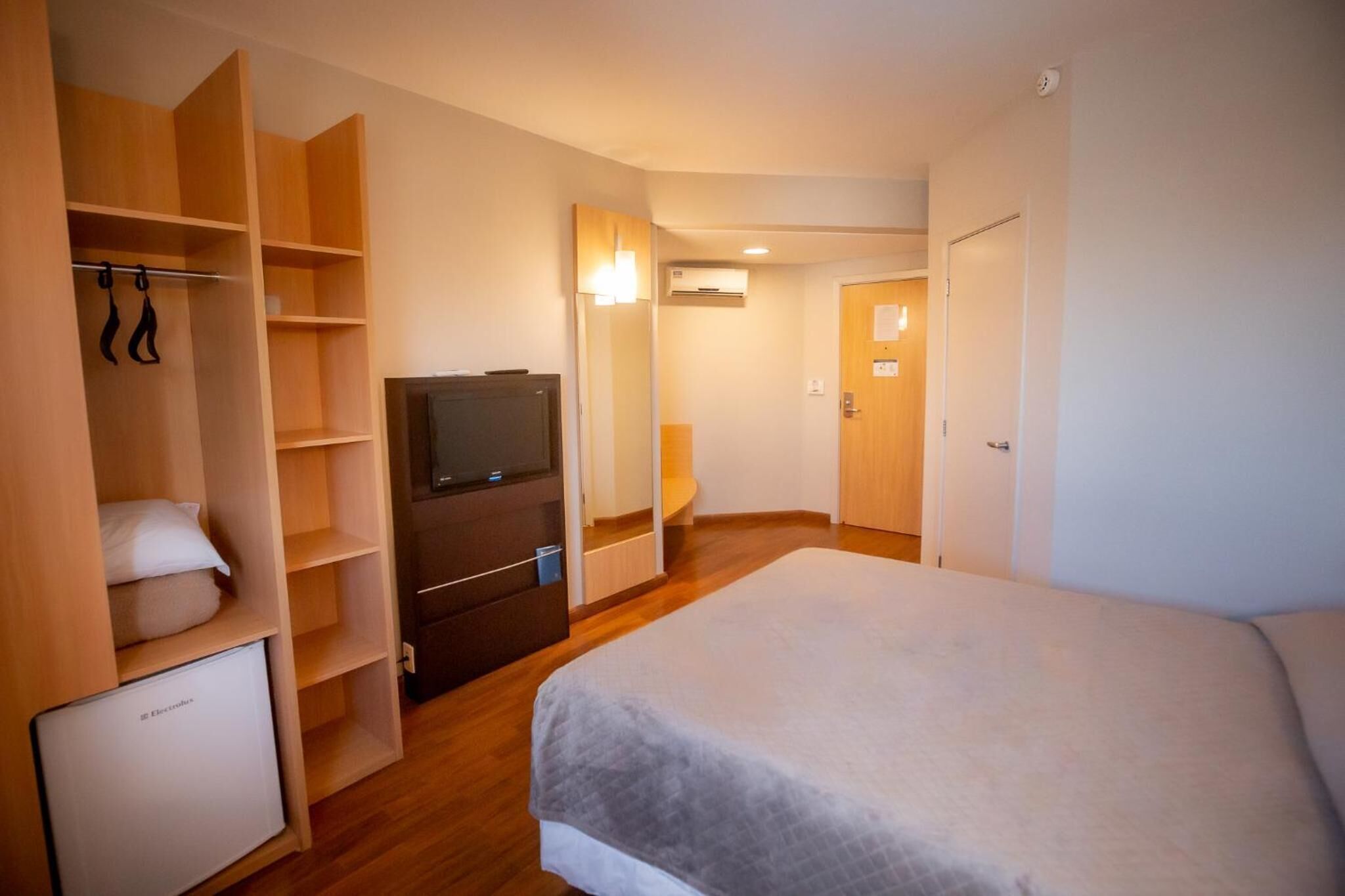 minibar, desk, laptop workspace, blackout curtains