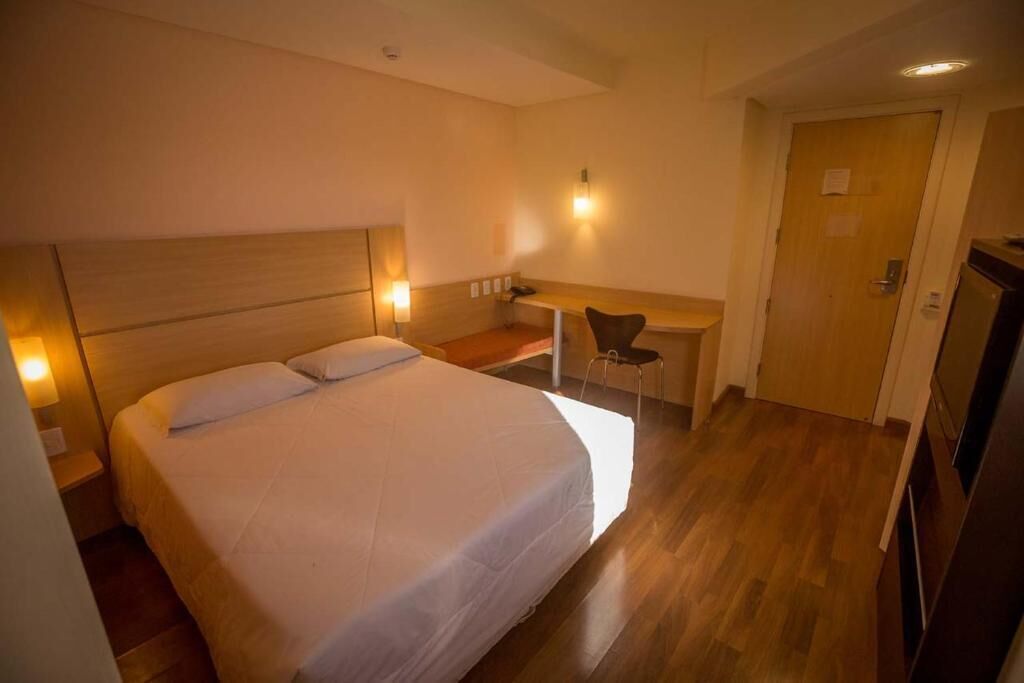 minibar, desk, laptop workspace, blackout curtains