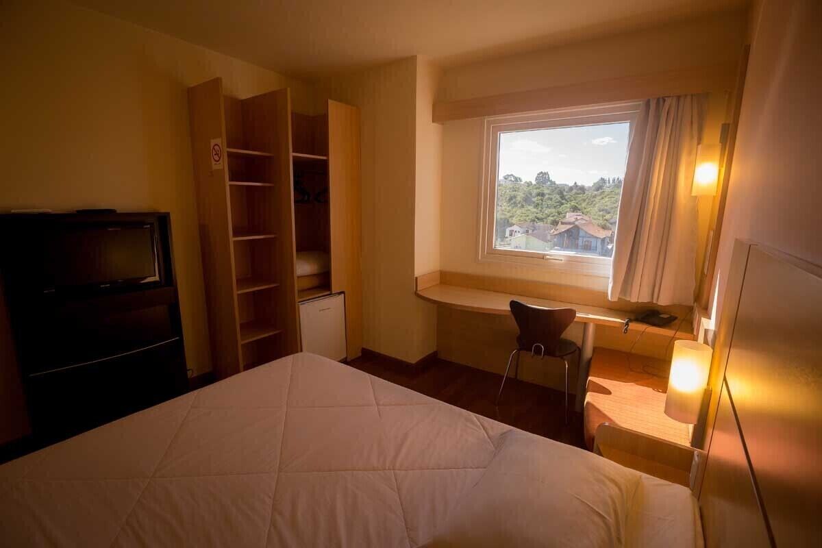 minibar, desk, laptop workspace, blackout curtains