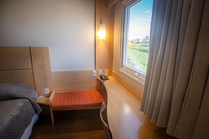 Executive Double or Twin Room | Minibar, desk, laptop workspace, blackout drapes