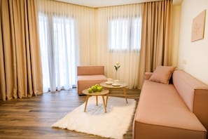 Family Suite | Living area | Flat-screen TV