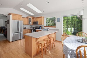 Fridge, microwave, oven, stovetop - The Hillside House located 8 miles from west entrance to Glacier National Park (Martin City)