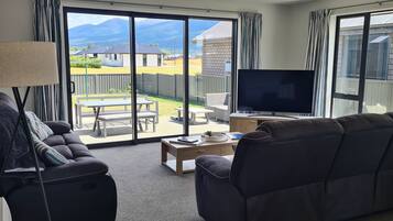 Smart TV, DVD player, table football, books